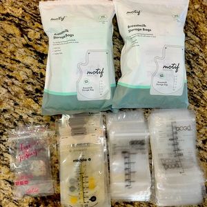 Around 230 sealed breastmilk storage bags. Medela, motif, GOGO, love your journ.